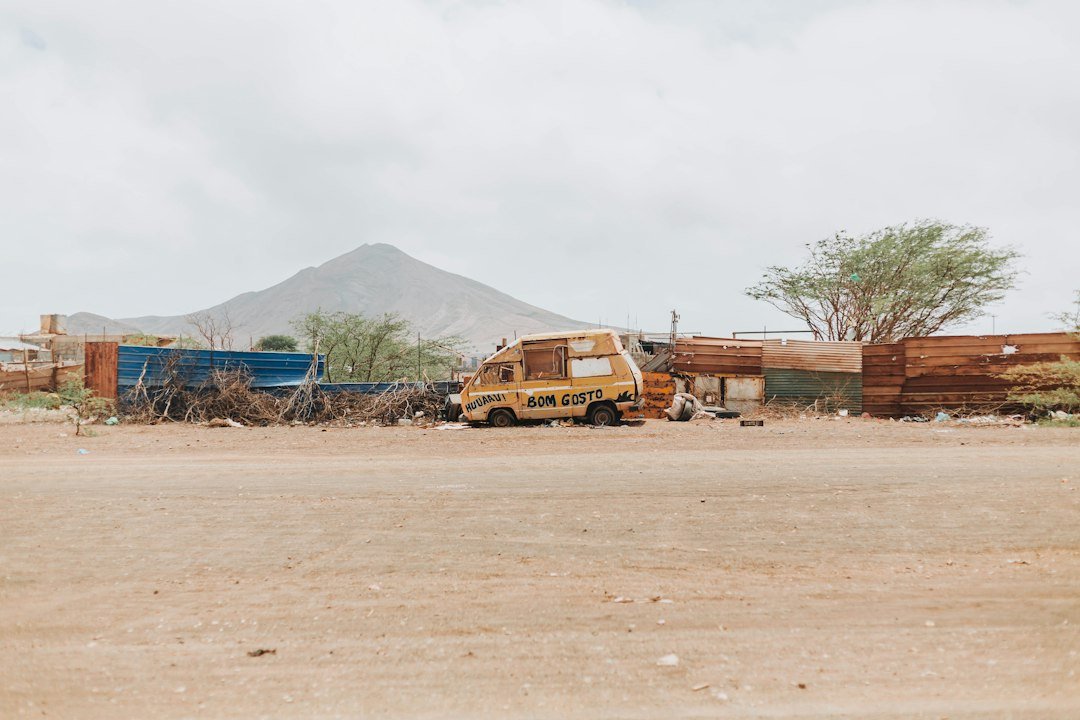 Trucks on an unpaved road illustrating humanitarian transport in Africa
